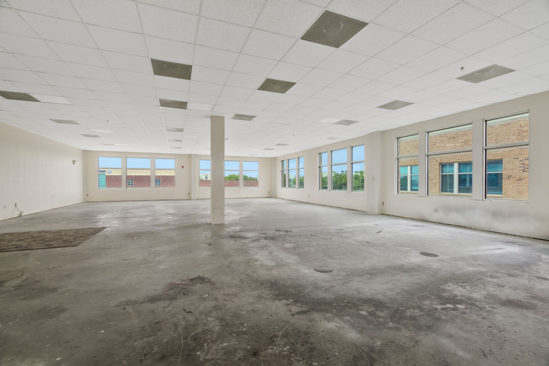 Open shell space with concrete floors