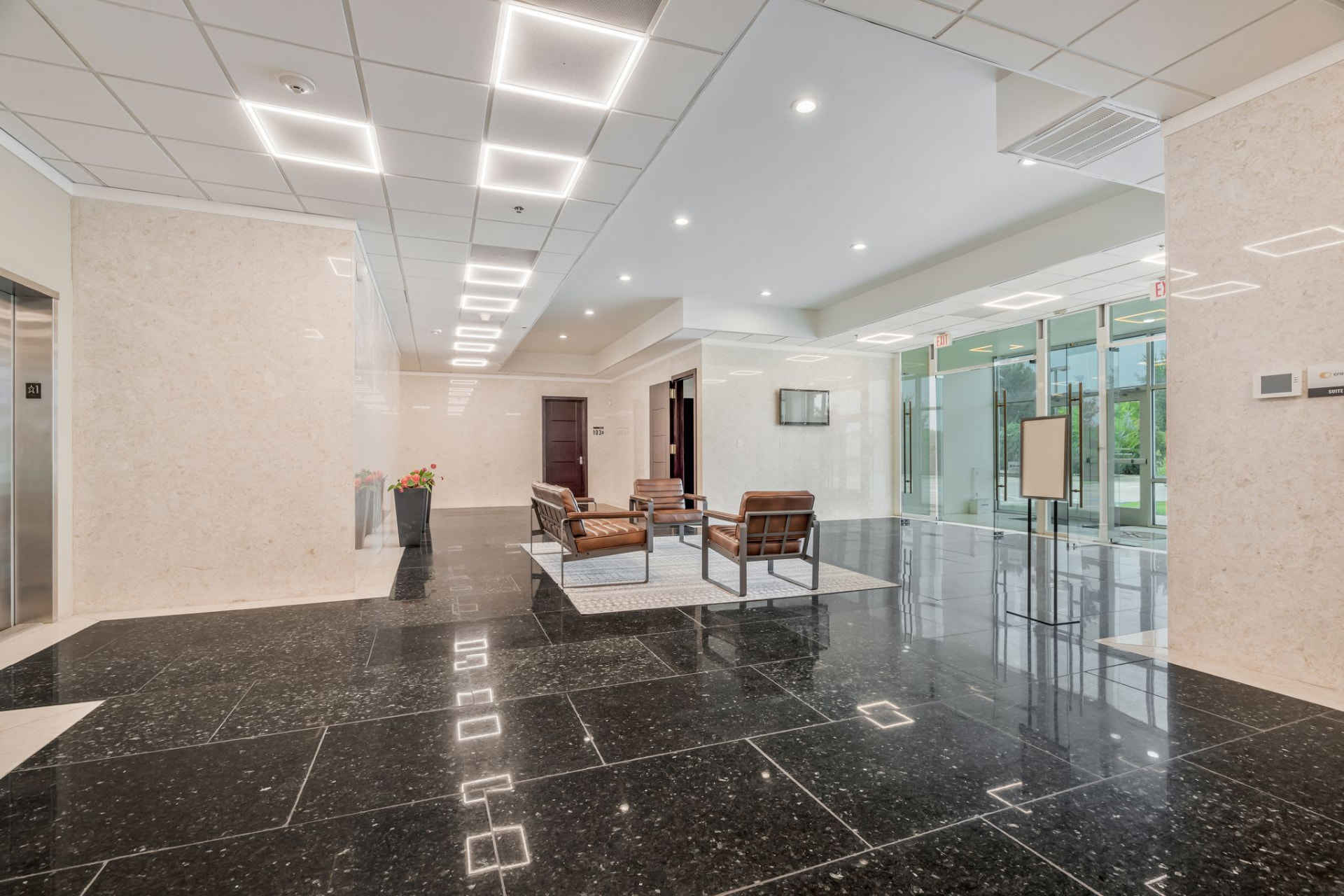 Lobby seating area with polished granite floors