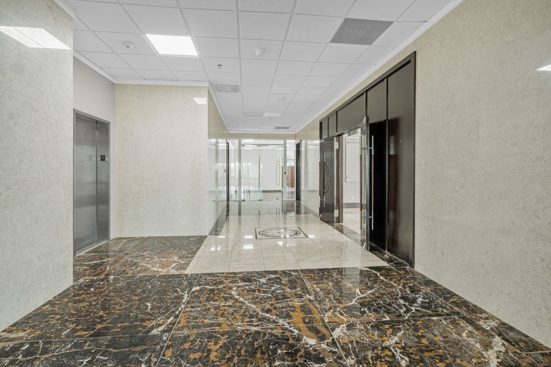 Marble lobby with elevator access
