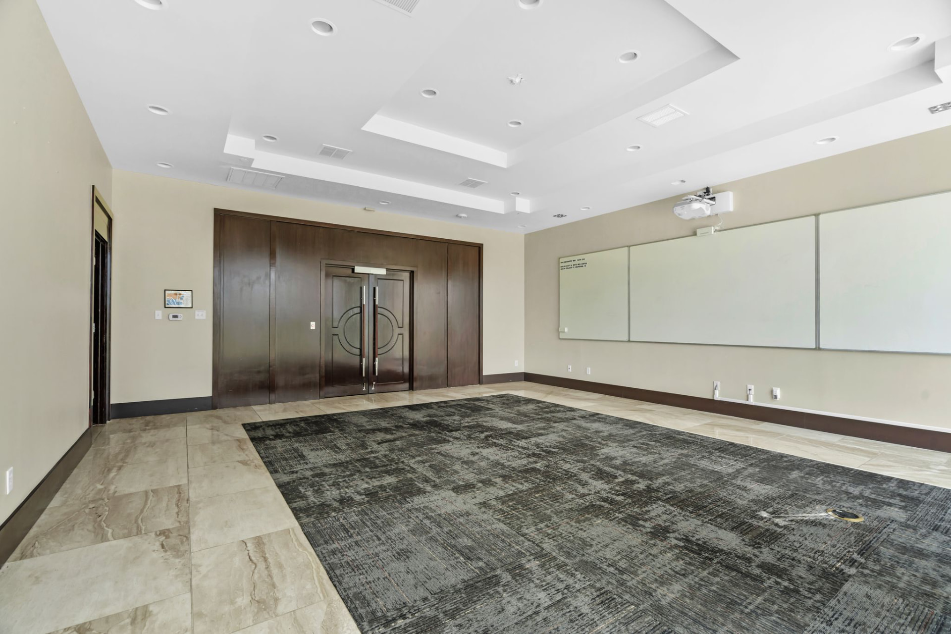 Executive boardroom with whiteboard wall